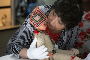 Inge at the US Holocaust Memorial Museum with her doll Marlene, which she kept with her during her time at Terezin. 